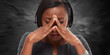 © grinny - Woman having a migraine headache.