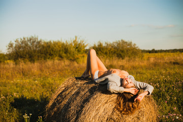 the beautiful naked girl on hay