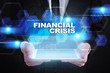 © WrightStudio - Businessman holding tablet PC with financial crisis concept.