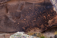 Petroglyphs Of Newspaper Rock, A Group Of Rockfaces With Over 650 Ancient Carvings In Petrified Forest National Park, Arizona. The Designs Were Created Between 650 And 2,000 Years Ago.