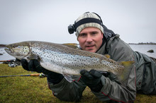 Happy Angler With Huge Sea Trout Fishing Trophy
