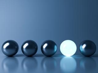 Fototapete - One blue glowing light ball standing out from the metal sphere balls on dark blue background with reflection and shadow , individuality and different creative idea concepts . 3D rendering.