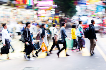 Sticker - crowd of people crossing a street in Hongkong