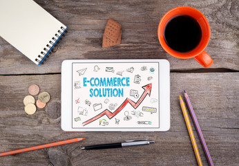 Canvas Print - E-Commerce Solution, Business Concept. Tablet on an old wooden table.