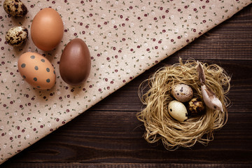 Wall Mural - Happy easter. Easter eggs and easter decoration on the wooden table