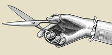 Woman's Hand With Scissors