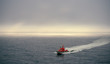 Pilot boat coming out of the mist on Puget Sound near Seattle Washington 