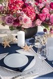 Fototapeta  - Table setting at a luxury wedding or another catered event. Marine themes