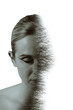 © grufnar - double exposure of a woman with closed eyes turning in to a thick forest