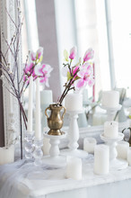 Shabby Chic Home Design. Beautiful Decoration Table With A Candles, Flowers In Front Of A Mirror