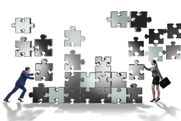 Business concept of teamwork with puzzle pieces