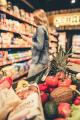 Wall Mural - Woman at the supermarket