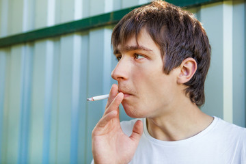 Canvas Print - Young Man with a Cigarette