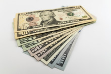 US American Dollar Money Bills Spread On White Background