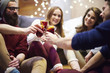 © Connect Images - Friends enjoying mulled wine in chalet