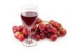 © kaiskynet - fresh red grapes  and glasses of red wine isolated on white background