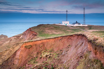 Sticker - Fog Signal Station on Flamborough Head / Flamborough Head is an eight mile long promontory on the Yorkshire coastline. It is a chalk headland, with sheer white cliffs