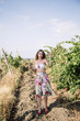 © boykovi1991 - Young beautiful woman in tuscany vineyard