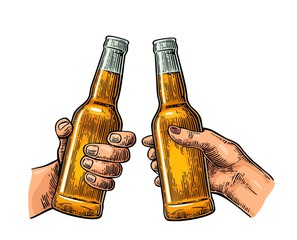 Wall Mural - Female and male hands holding and clinking open beer bottles.