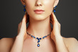 © looking2thesky - Beautiful woman with a sapphire necklace. Fashion concept