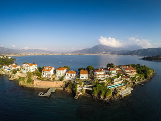 Wall Mural - A small populated island in the harbor of Fethiye, Turkey