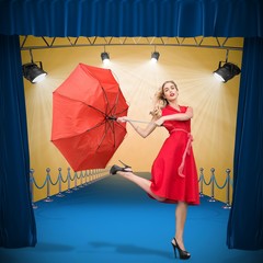 Wall Mural - Composite image of elegant blonde holding umbrella