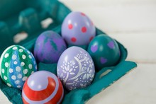 Multicolored Easter Eggs In The Carton