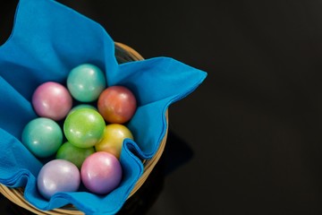 Wall Mural - Colorful chocolate Easter eggs in napkin