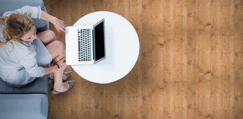Wall Mural - composite image of woman on her laptop