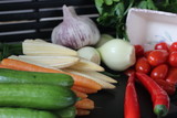 Fototapeta Kuchnia - fresh vegetables and herbs, oregano, sage, chive, parsley, dill, onion, cucumber, green vegetables,  red vegetables, tomatoes, peper, red peper,  