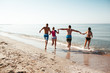 © Kirill Grekov - Friends on the beach. Have fun at sunny summer day