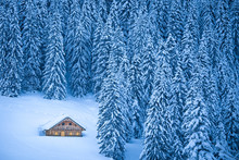 Traditional Mountain Cabin In Winter Wonderland In The Alps