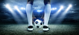 Fototapeta Sport - Football player with ball