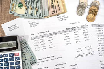 income statement with dollar cash and pen, bank statement, finance saving and investment concept.