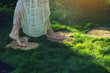 © Artem - girl walking barefoot on the stones in heart shape