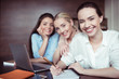 © LIGHTFIELD STUDIOS - portrait of cheerful businesswomen working on new business idea
