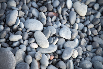 Wall Mural - Pyramid from stones on the black sand beach in Iceland. The image close up. March 2017