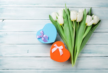 White Tulips And Heart Shaped Gift Boxes
