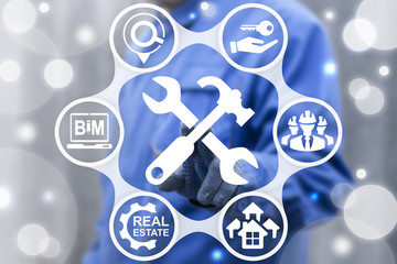 Property service repair concept. Man touched wrench hammer icon on virtual screen. Real estate business. Building, BIM. Home, office for sale. Apartment renovation. Architecture, designing build.