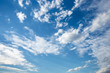 Blue sky with white fluffy clouds. Sky daylight. Natural sky composition.