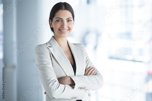 Fotografie, Obraz Smiling Pretty Business Woman With Arms Crossed