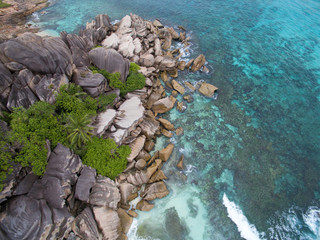 Wall Mural - Seychelles Island white tropical paradise beach, turquoise sea and granite rocks aerial landscape. La Digue Grand Anse beach seascape. 