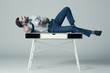 businessman lying on table