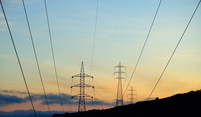 High voltage lines and electric towers background