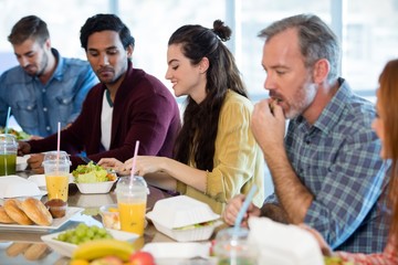 Creative business team having meal