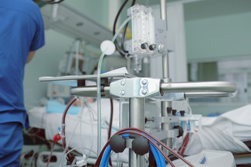 Wall Mural - Doctor at the bedside in modern hospital room