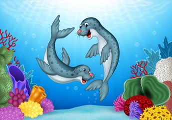 Wall Mural - Cartoon seals with under water background