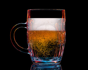 Silhouette of colorful beer glass with on black background