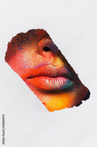 Lips of model with colorful art make-up, close-up