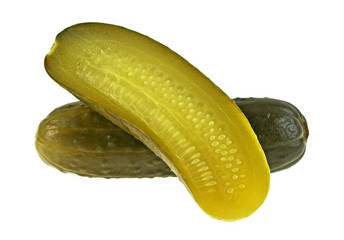 Wall Mural - One pickled cucumber cut in half on white background